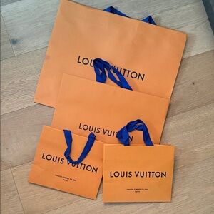 Louis Vuitton Bold Orange Bags with Blue Accents